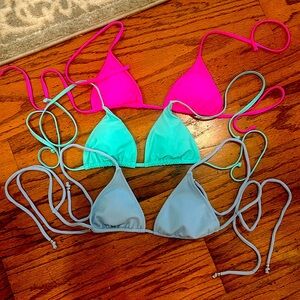 3 set of swimsuit tops NEVER WORN! run small